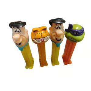 PEZ dispensers: Fred Flintstone, Garfield, TMNT Donatello, Loose Lot of 4